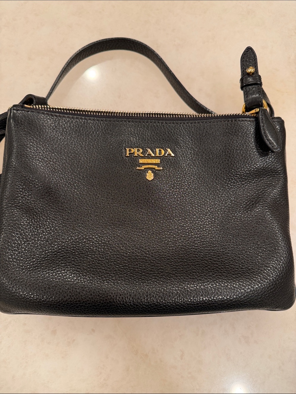 Authentic Prada Black Pebbled Leather Shoulder Bag with Gold Logo Accent
